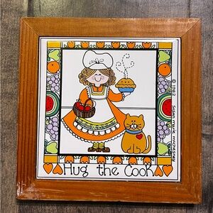 Vintage 'Hug the Cook' Wall Art with Orange Accents